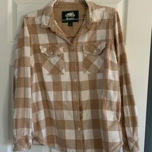 Root’s plaid flannel shirt